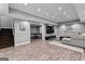Finished basement featuring a large entertainment area, with adjacent ping pong room at 55 Jolie Ln, Sharpsburg, GA 30277