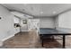 Game room featuring a ping pong table and a snack bar with white cabinets at 55 Jolie Ln, Sharpsburg, GA 30277