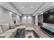 Finished basement with recessed lighting, wood flooring, and neutral decor offers a versatile living space at 55 Jolie Ln, Sharpsburg, GA 30277