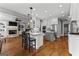 Modern kitchen with stainless steel appliances and center island at 55 Jolie Ln, Sharpsburg, GA 30277