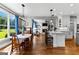 Open kitchen connected to the dining and living rooms at 55 Jolie Ln, Sharpsburg, GA 30277