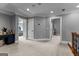 Open upper level featuring multiple rooms, neutral colored walls, and wall to wall carpet at 55 Jolie Ln, Sharpsburg, GA 30277