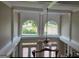 Unique architectural detail featuring transom windows and views of the surrounding landscape and body of water at 413 Canterbury Way, Jonesboro, GA 30236