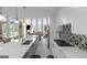 Spacious kitchen island featuring a breakfast bar and overlooking the adjacent living area at 413 Canterbury Way, Jonesboro, GA 30236