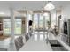 Spacious kitchen island features a breakfast bar and overlooks the adjacent living area at 413 Canterbury Way, Jonesboro, GA 30236
