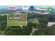 A beautiful home, nestled among mature trees near a lake and local shops at 190 Willow Lake Ln, Sharpsburg, GA 30277