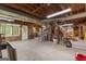 Spacious unfinished basement with access to the backyard with a walkout door at 190 Willow Lake Ln, Sharpsburg, GA 30277