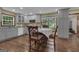 Updated kitchen features shaker cabinets, granite countertops, stainless appliances, and hardwood floors at 190 Willow Lake Ln, Sharpsburg, GA 30277