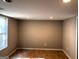 Finished basement with tiled flooring, recessed lighting, and a window allowing natural light at 149 Titan Rd, Stockbridge, GA 30281