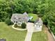 A beautiful home with an in-ground pool and a matching detached garage, with circular drive at 2975 Hickory Hill Rd, Brooks, GA 30205