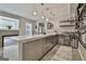 Finished basement with bar, countertop seating, shelves, and sink at 2975 Hickory Hill Rd, Brooks, GA 30205