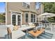 Spacious deck with outdoor seating, dining area, and access to the backyard at 2975 Hickory Hill Rd, Brooks, GA 30205