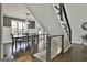 Elegant dining room with a modern chandelier, ample natural light, and hardwood floors at 2975 Hickory Hill Rd, Brooks, GA 30205
