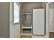 Inviting entryway features coat rack, storage, bench, and neutral colors for a welcoming atmosphere at 2975 Hickory Hill Rd, Brooks, GA 30205