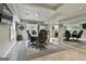 Entertaining game room with poker table, recessed lighting and access to bar and fireplace at 2975 Hickory Hill Rd, Brooks, GA 30205