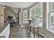 Breakfast nook featuring lots of light with hardwood floors and neutral paint colors at 2975 Hickory Hill Rd, Brooks, GA 30205