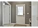 Mud room featuring tile floors, neutral paint, and exterior door with window at 2975 Hickory Hill Rd, Brooks, GA 30205