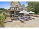 Outdoor patio area with seating, lounge chairs, and a screened in porch at 2975 Hickory Hill Rd, Brooks, GA 30205