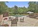 Backyard featuring a pool, outdoor fire pit, patio seating, and a garden shed at 2975 Hickory Hill Rd, Brooks, GA 30205