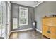 Well-lit room features neutral colors, hardwood floors, and modern fixtures and details at 2975 Hickory Hill Rd, Brooks, GA 30205