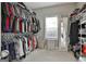 Spacious walk-in closet providing ample storage with rods and shelving at 2975 Hickory Hill Rd, Brooks, GA 30205