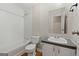 Bathroom featuring vanity, toilet, and shower with a tub at 368 Hemlock Ln, Locust Grove, GA 30248