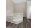 Relaxing bathroom with a corner tub creating a private oasis within the home at 368 Hemlock Ln, Locust Grove, GA 30248