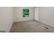 Bedroom with a window and neutral colored carpet at 368 Hemlock Ln, Locust Grove, GA 30248