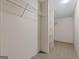 Spacious walk-in closet featuring carpet floors and installed wire shelving at 368 Hemlock Ln, Locust Grove, GA 30248