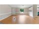 Bright living room featuring wood floors and bright light perfect for both relaxing and entertaining at 368 Hemlock Ln, Locust Grove, GA 30248