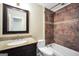 Updated bathroom features a tile shower, showerhead and stylish beadboard at 602 Pine Knoll Court, Mcdonough, GA 30252