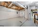 Unfinished basement area with visible ducts, pipes, and room for storage at 1432 Almand Creek Drive Sw, Conyers, GA 30094