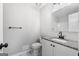 Stylish bathroom featuring modern fixtures, granite countertops, and neutral paint at 1432 Almand Creek Drive Sw, Conyers, GA 30094
