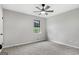 Cozy bedroom with a ceiling fan and a window at 1432 Almand Creek Drive Sw, Conyers, GA 30094