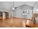 Spacious living room with vaulted ceilings, hardwood floors, and natural light at 7972 Woods Lane, Jonesboro, GA 30236