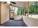 Outdoor screened porch with ceiling fan and a view of the private backyard area at 7972 Woods Lane, Jonesboro, GA 30236
