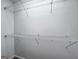 Walk-in closet with wire shelving for storage, providing ample space for organization at 7972 Woods Lane, Jonesboro, GA 30236