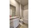 Bright bathroom featuring a vanity with a sink, a toilet and a bathtub at 237 Cranapple Ln, Mcdonough, GA 30253