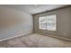 Bedroom featuring a window with backyard views at 237 Cranapple Ln, Mcdonough, GA 30253