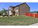 Two-story home with brick and vinyl siding, a two-car garage, and manicured shrubs at 237 Cranapple Ln, Mcdonough, GA 30253