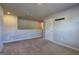 Cozy loft space with neutral walls, carpet and natural light at 237 Cranapple Ln, Mcdonough, GA 30253