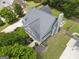 Aerial view of the home highlighting its spacious backyard and patio with a fire pit at 330 Bay Grove Rd, Loganville, GA 30052