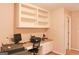 Office desk with multiple shelves and computer equipment at 330 Bay Grove Rd, Loganville, GA 30052