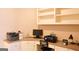 Office desk with multiple shelves and computer equipment at 330 Bay Grove Rd, Loganville, GA 30052