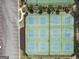 Aerial view of the community's tennis courts, offering a great recreational amenity with parking spaces nearby at 330 Bay Grove Rd, Loganville, GA 30052
