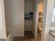 Bathroom with shelves stocked with towels and other bath items, offering convenience and organization at 2276 Waycross Ln # 21, Dacula, GA 30019