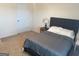 Cozy bedroom featuring a plush bed and a neutral color scheme, promoting relaxation and rest at 2276 Waycross Ln # 21, Dacula, GA 30019