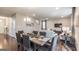 Open-concept living and dining area with hardwood floors and neutral-colored furnishings at 2276 Waycross Ln # 21, Dacula, GA 30019