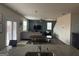 Open-concept living room with modern furnishings, a dining area, and lots of natural light at 2276 Waycross Ln # 21, Dacula, GA 30019
