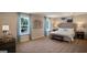 Spacious main bedroom suite with natural light, carpet floors, and neutral walls at 2276 Waycross Ln # 21, Dacula, GA 30019